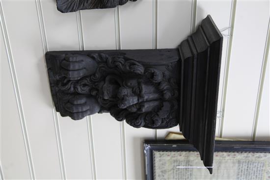 An 18th century and later oak corbel, W.16.5in.